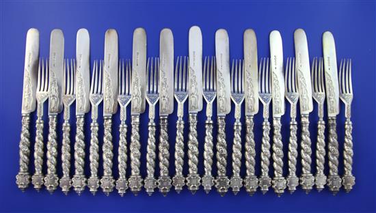 Twelve pairs of Victorian ornate silver dessert eaters, knife 8in.